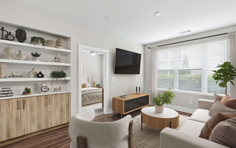 a living room with a couch, chair and a tv