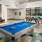 game room with a pool table and shuffleboard