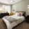 Large furnished bedroom with windows at Annett modern apartments in Atlanta, GA.