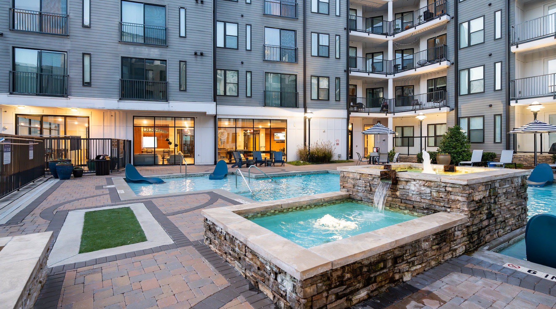 Pool and courtyard area at Annett apartments for rent in Atlanta, GA. Pool and courtyard area at Annett apartments for rent in Atlanta, GA.