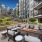 outdoor lounge area with modern seating and a firepit